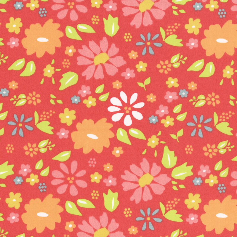 fabric pattern of florals spread across a red background