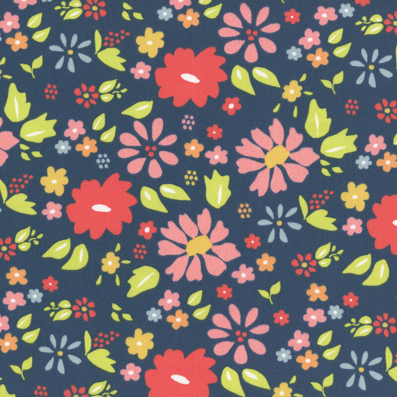 fabric pattern of florals spread across a navy background