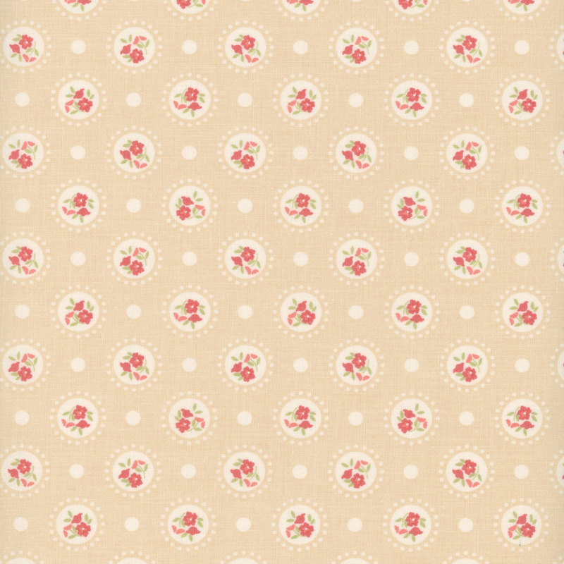 Tan fabric with medallions of red flowers on a polka dotted background.