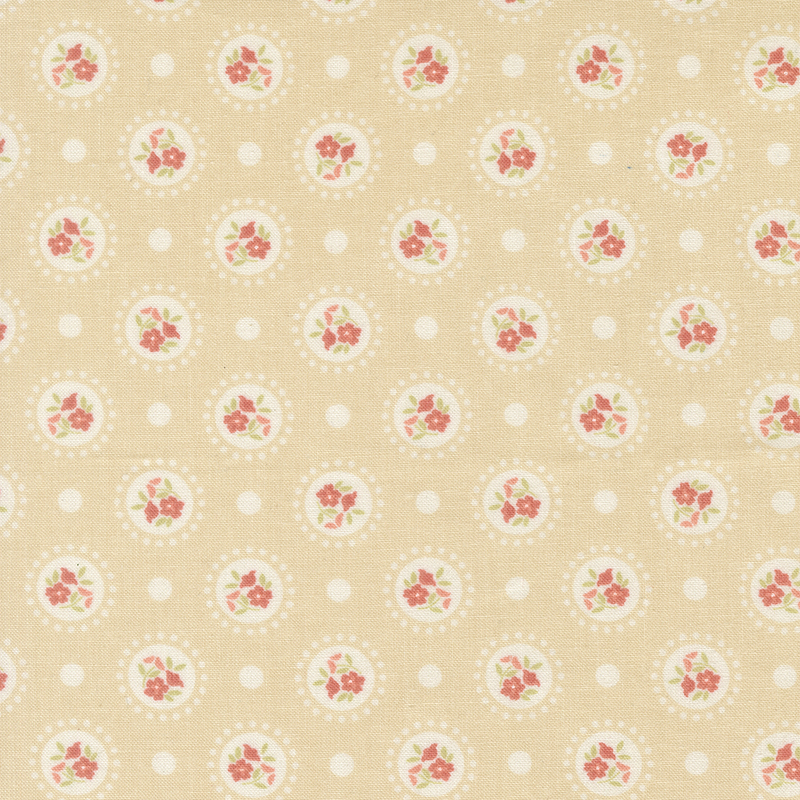 Tan fabric with medallions of red flowers on a polka dotted background.