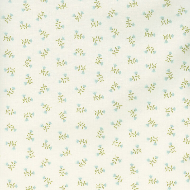 Cream fabric with ditsy sprigs of two blue flowers.