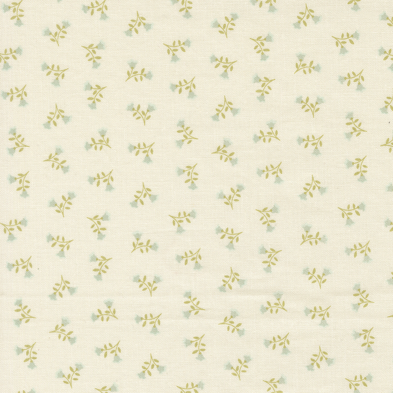 Cream fabric with ditsy sprigs of two blue flowers.