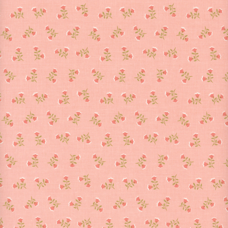 Pink fabric with ditsy sprigs of two flowers.