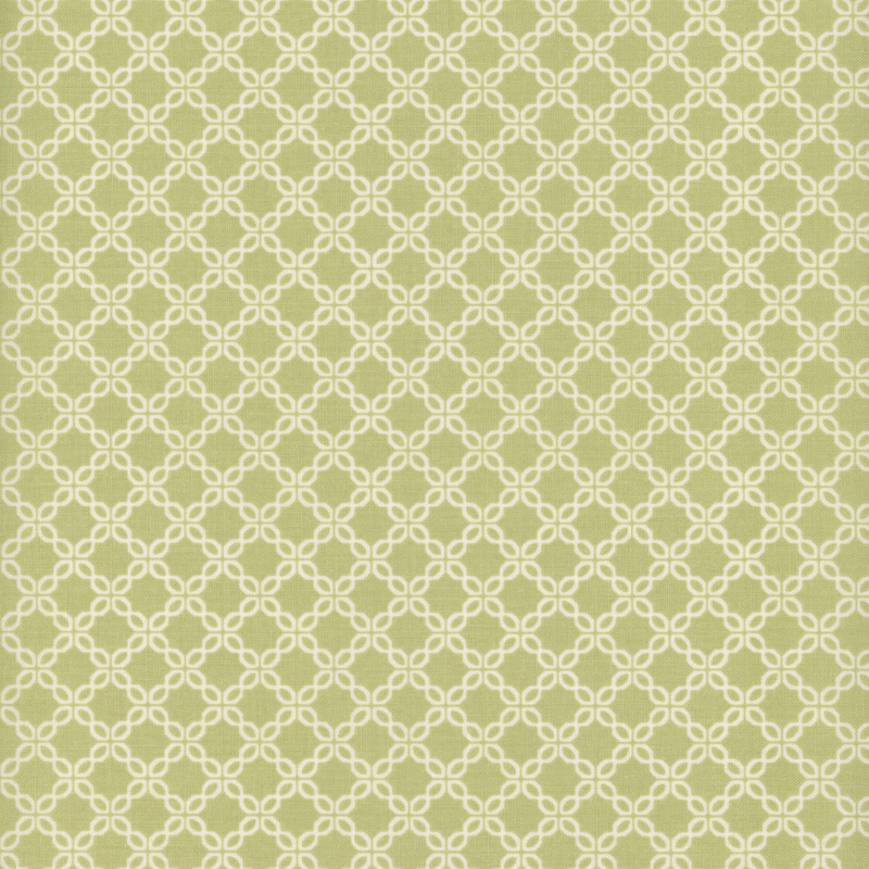 Pear green fabric with a chain-like geometric pattern.