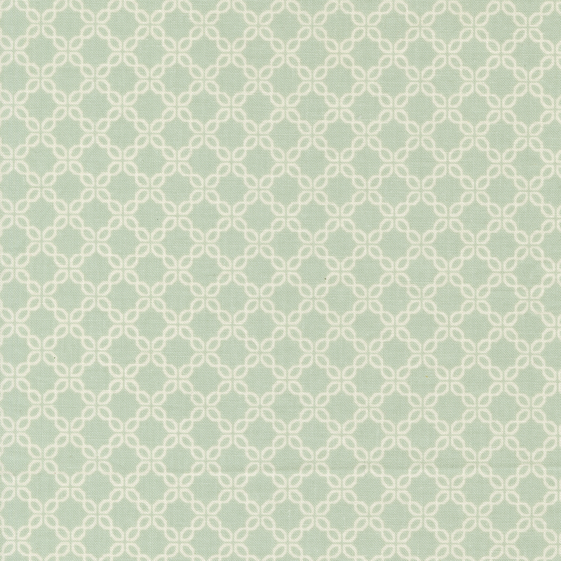 Aqua fabric with a chain-like geometric pattern.