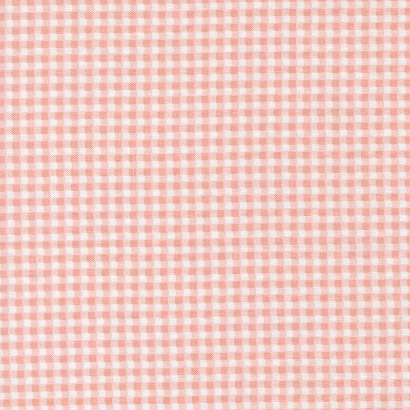 Pink fabric with tiny gingham print.