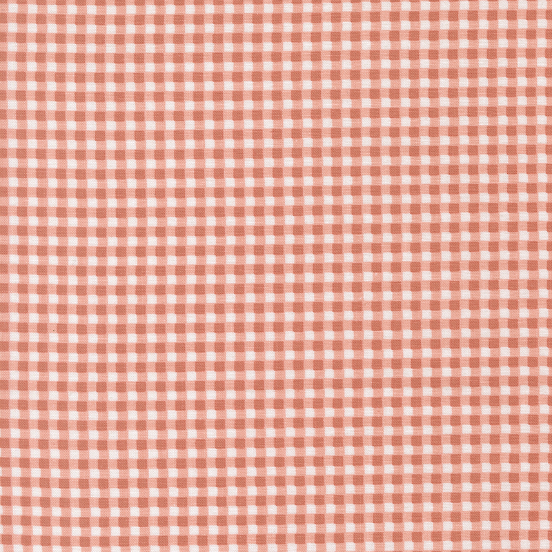 Coral pink fabric with tiny gingham print.