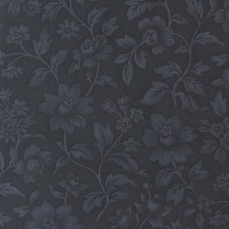 fabric pattern of florals on a navy background