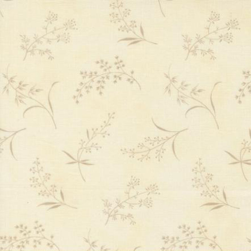 fabric pattern of ditsy leaves and flowers on a cream background