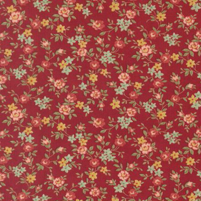 fabric pattern of roses scattered all over a red background