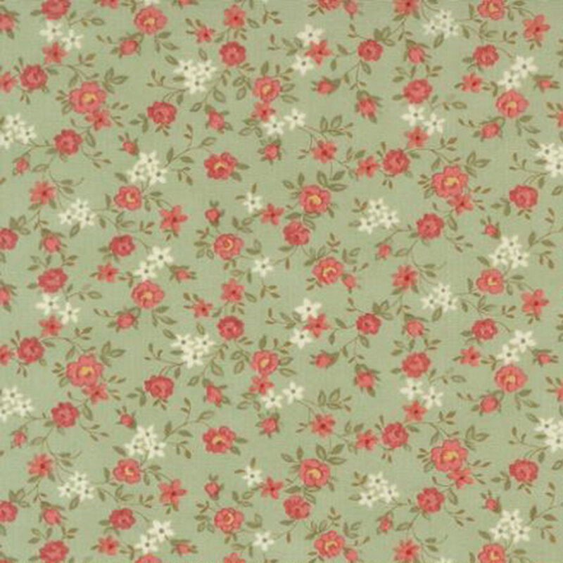 fabric pattern of roses scattered all over a green background