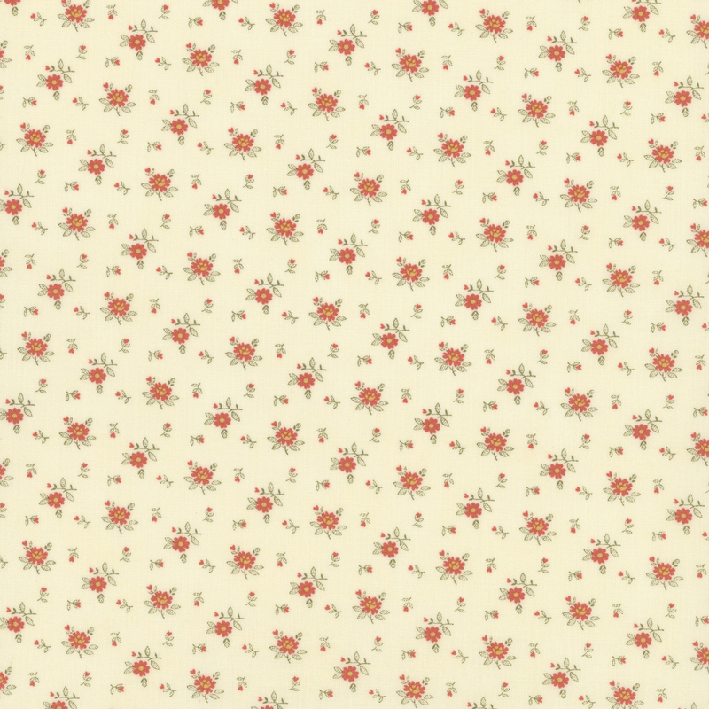 Fabric pattern of roses scattered all over a cream background.