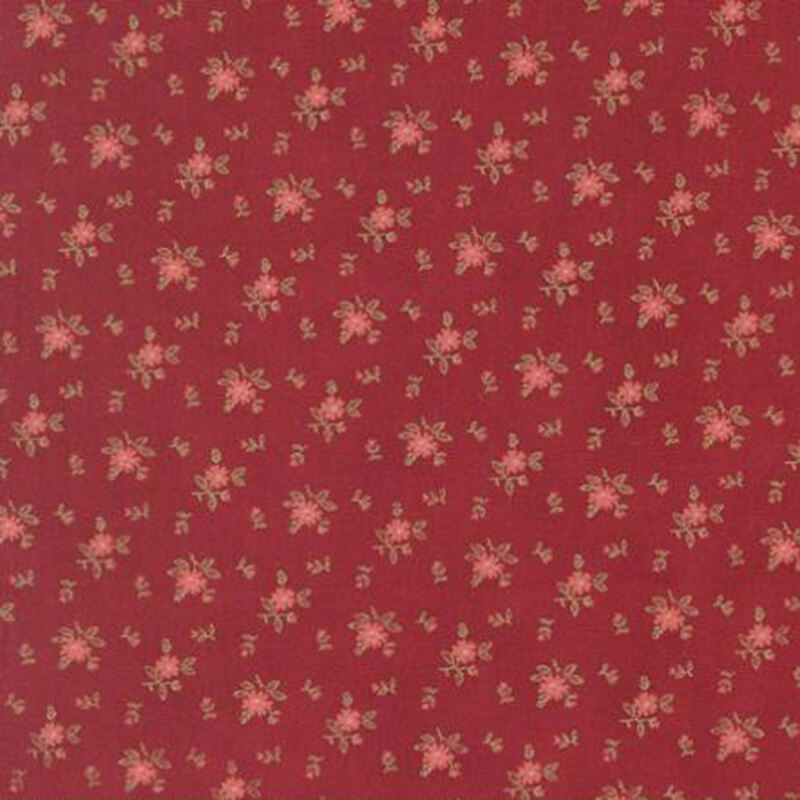 fabric pattern of roses scattered all over a red background