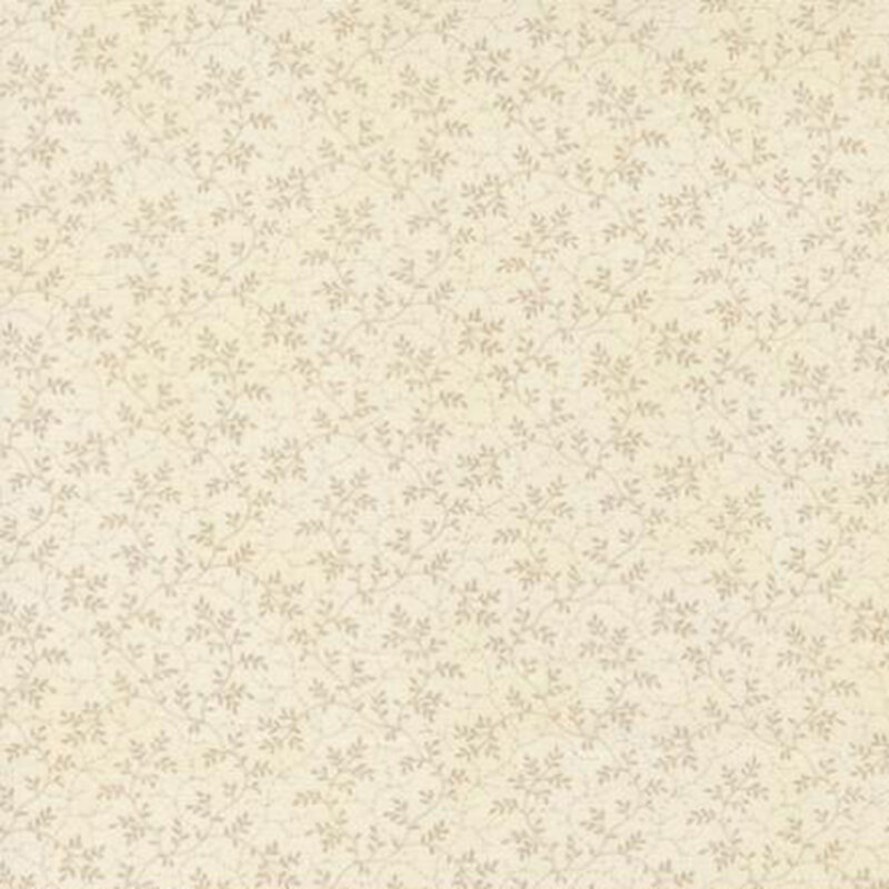 fabric pattern of roses scattered all over a cream background