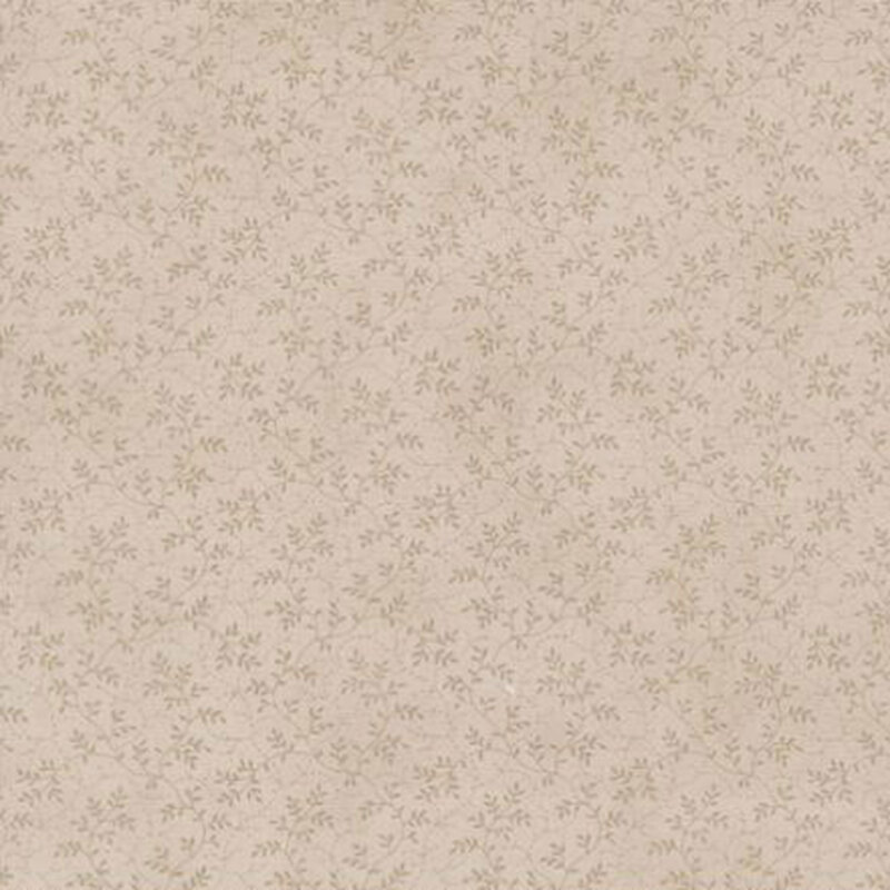 fabric pattern of roses scattered all over a taupe background