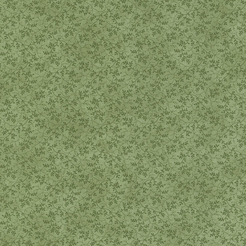 fabric pattern of thin, leafy vines scattered all over a green background.