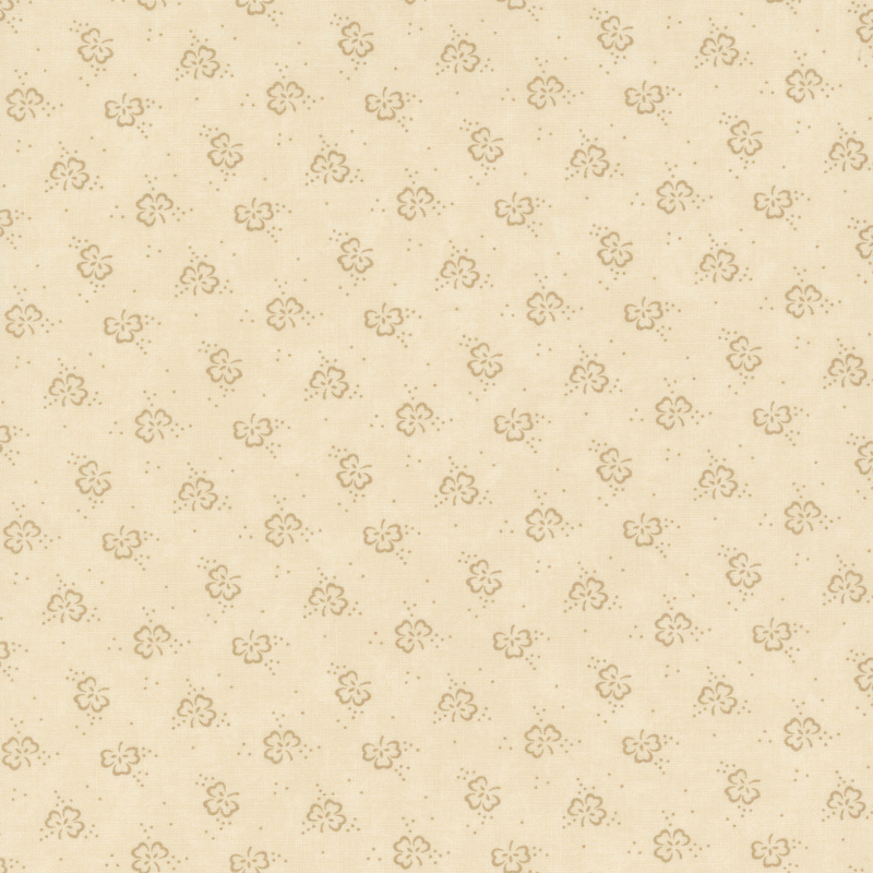 Light beige fabric with a subtle pattern of small, repeating floral shapes in a slightly darker shade.