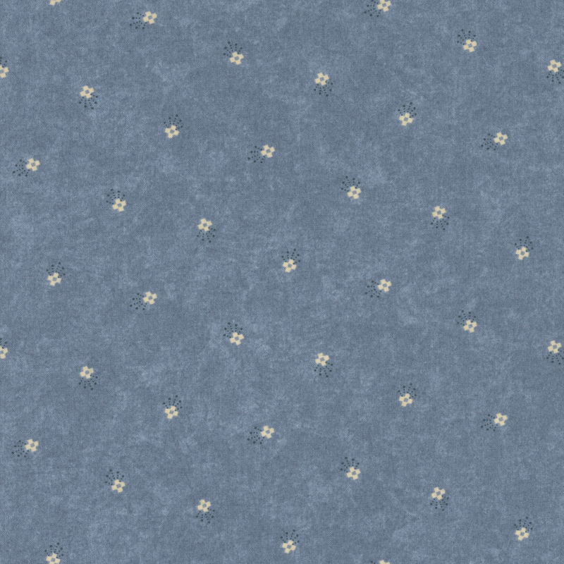 Light blue fabric with scattered small yellow flowers and blue accents.