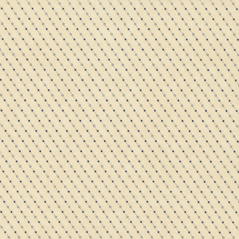 Repeating pattern of small black and white dots on a light yellow diagonal fabric.