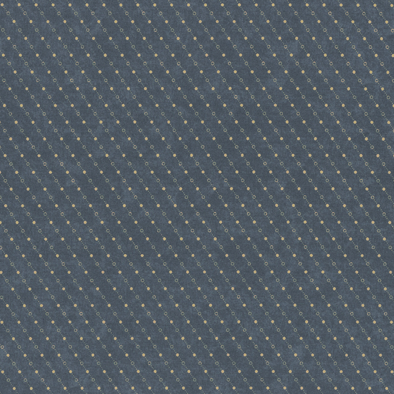 A dark blue fabric with a diagonal pattern of small gold dots evenly spaced throughout.