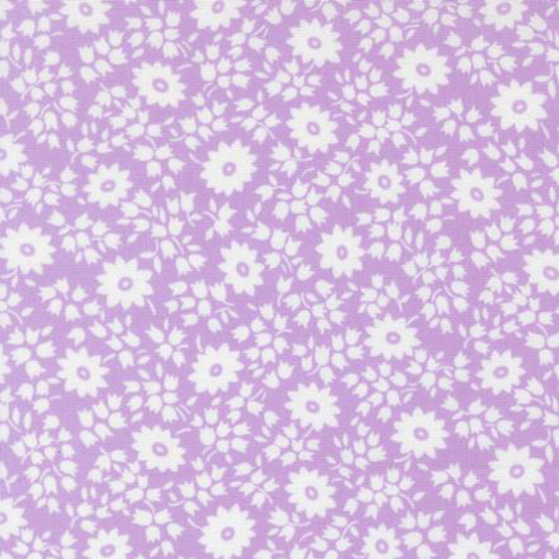 fabric pattern of white florals all over a lilac background