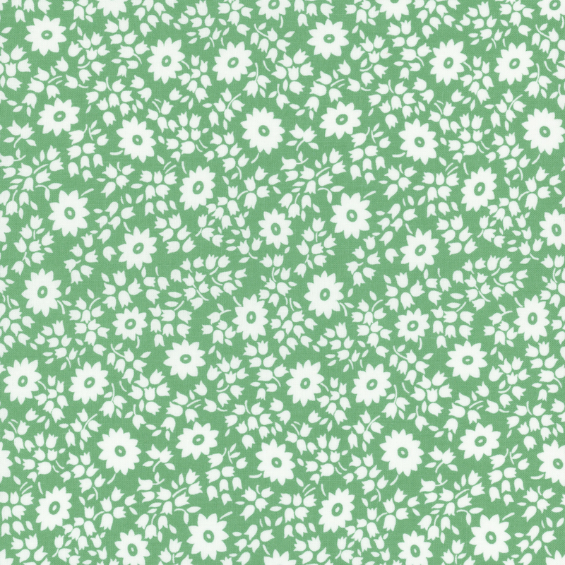 fabric pattern of white florals on a green background