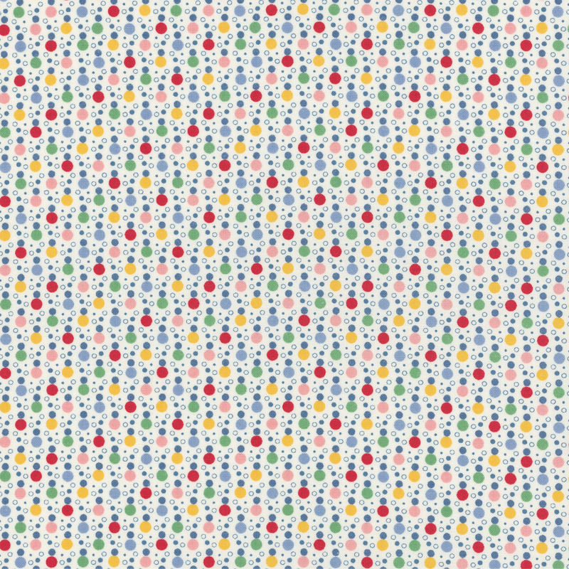 fabric pattern of colorful dots all over a white background