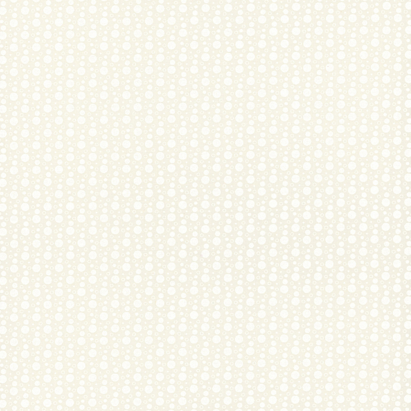 fabric pattern of white dots all over a cream background