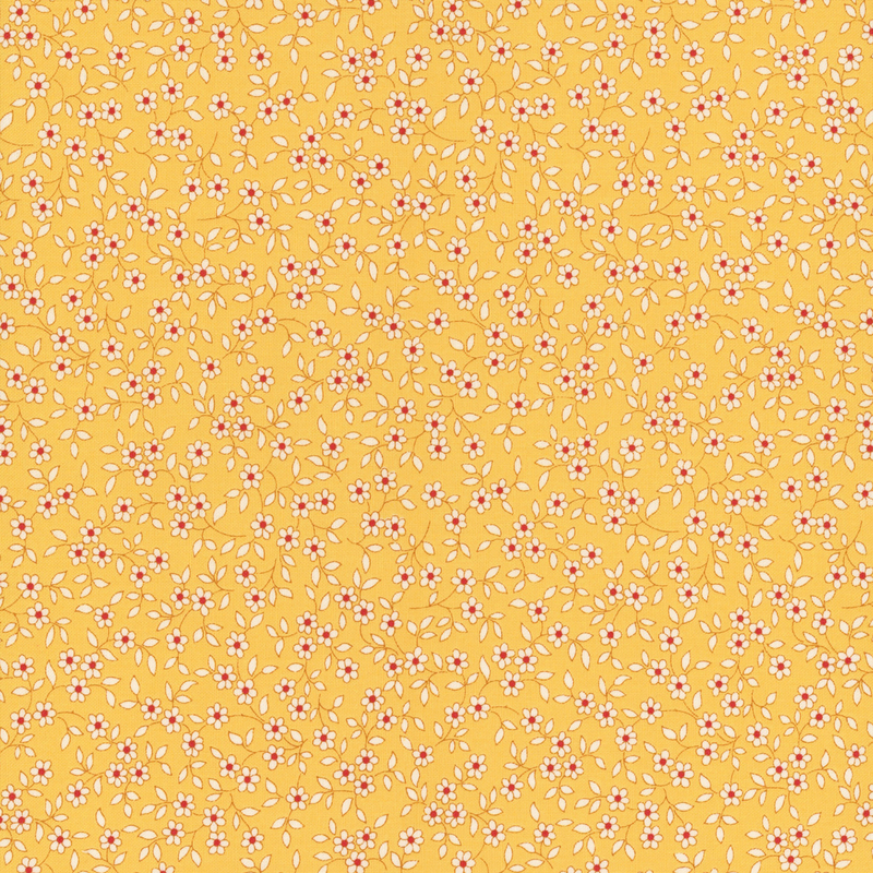 fabric pattern of white florals scattered all over a yellow background