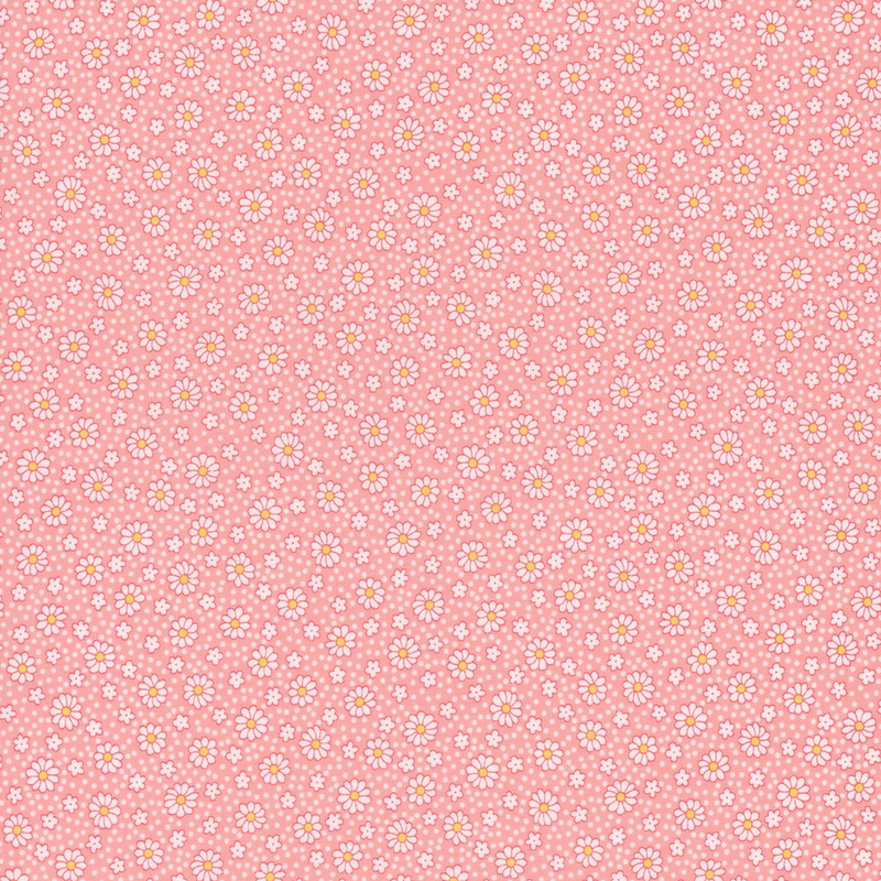 fabric pattern of white daises all over a pink background