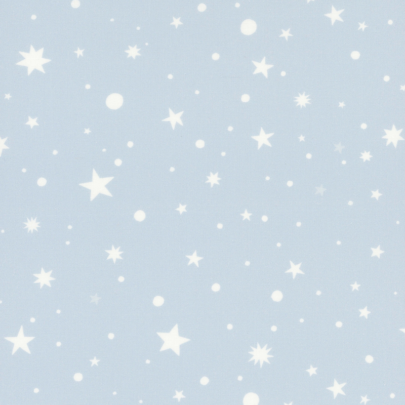 Blue fabric with scattered stars and polka dots.