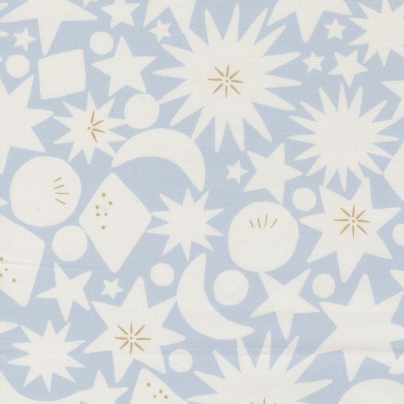 Blue fabric with stars, starbursts, crescent moons, diamonds, and circles.