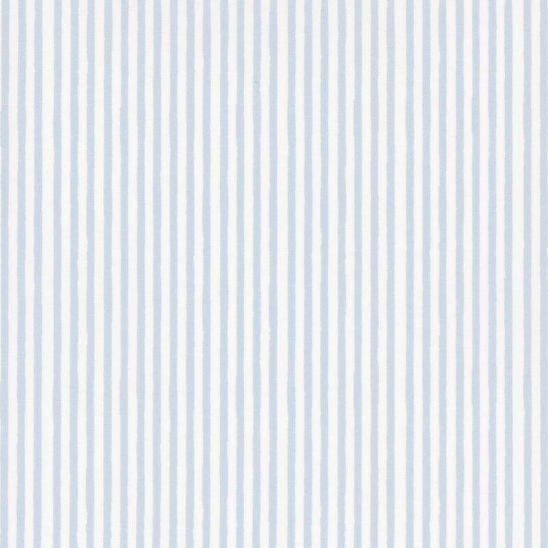 Cream fabric with thin blue stripes.