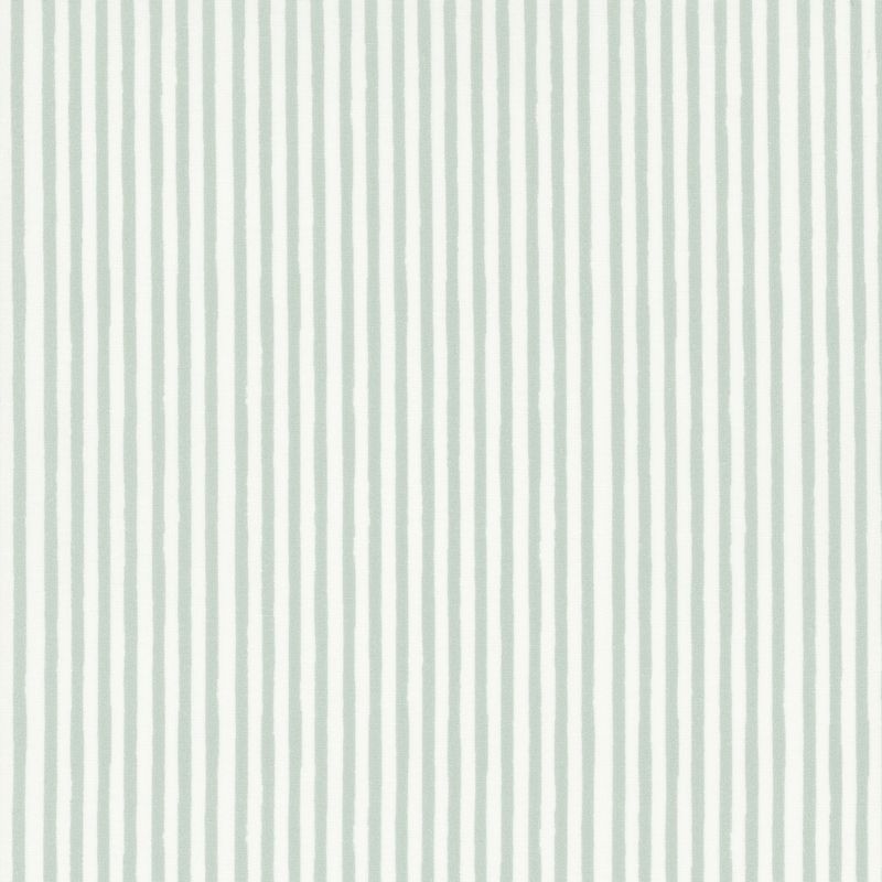 Cream fabric with thin green stripes.