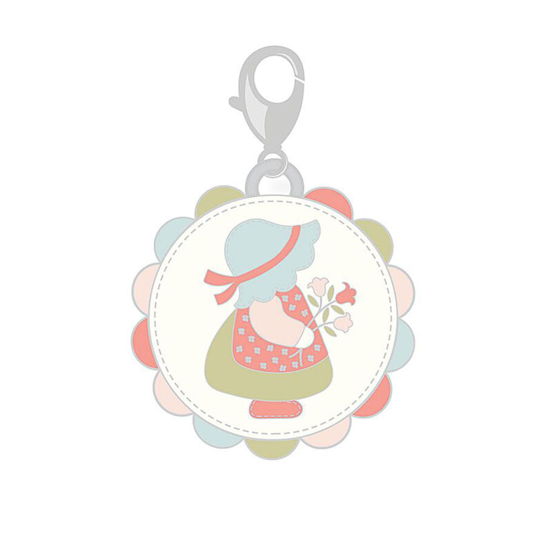 Enamel pin with a metal clip with the design of a small girl wearing a large bonnet and holding flowers.