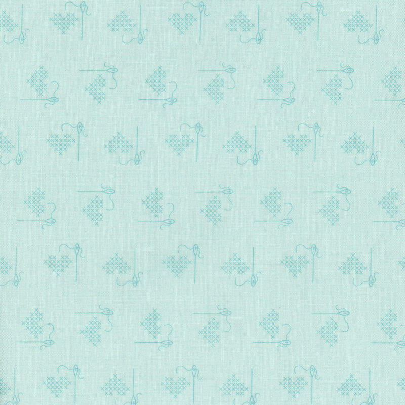 Light aqua fabric with tonal ditsy cross-stitched hearts.