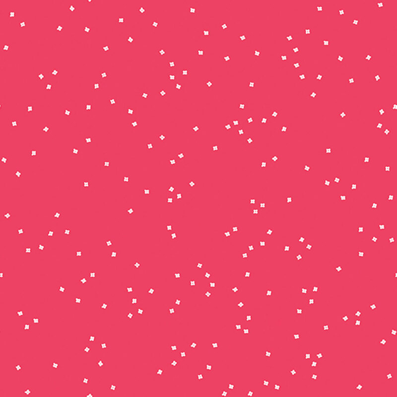 Bright pink fabric with tossed, tiny floral blossoms.