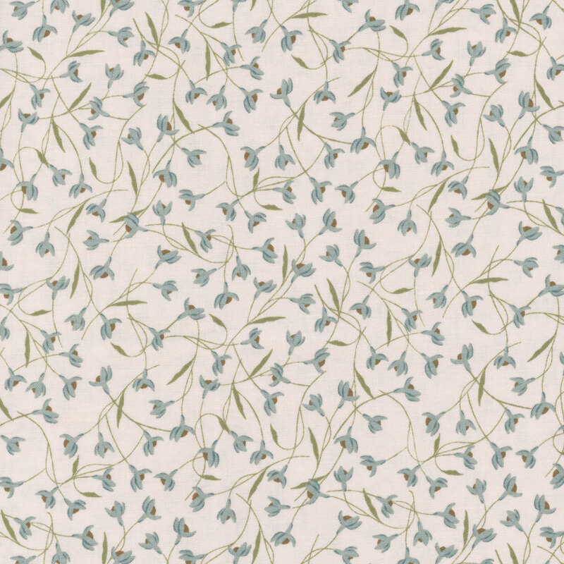 Cream fabric with overlapping snowdrop flowers.