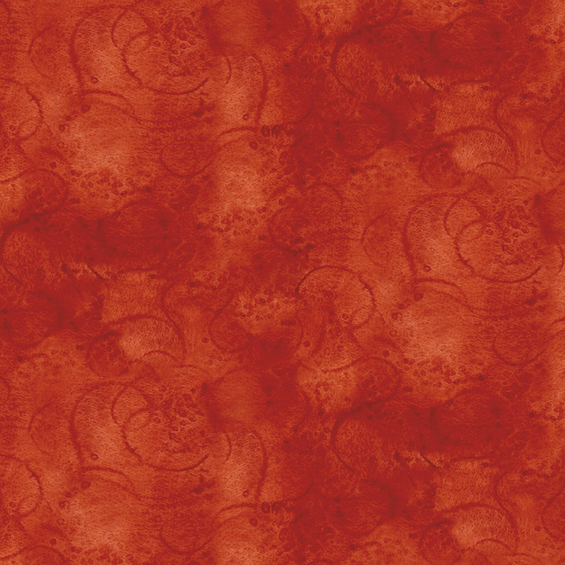 Tomato red fabric with tonal mottling and swirling designs.