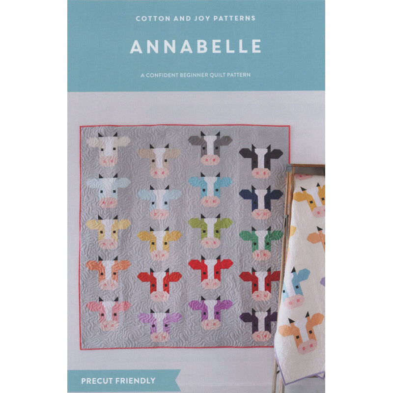 Cover of a quilting pattern titled Annabelle, featuring colorful cow designs on a quilt and fabric.