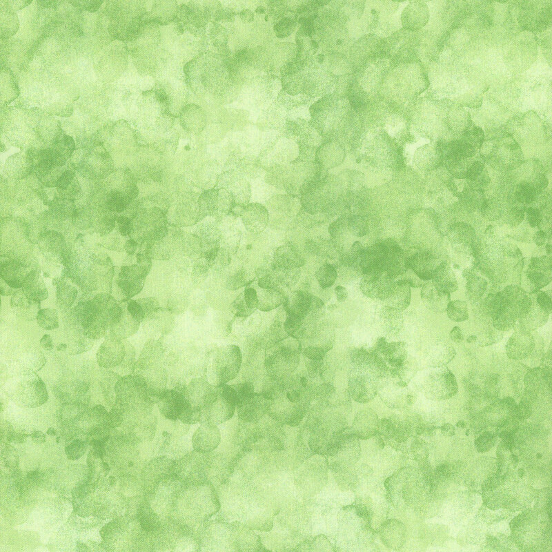 fabric pattern of a green marbled background