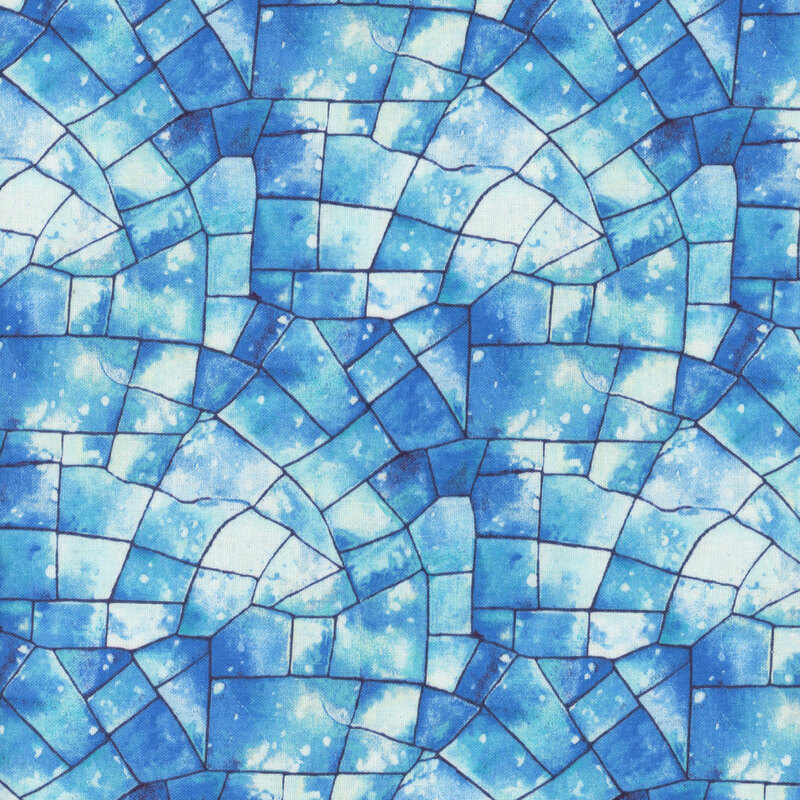 Blue and aqua fabric with a stained glass kaleidoscope texture.