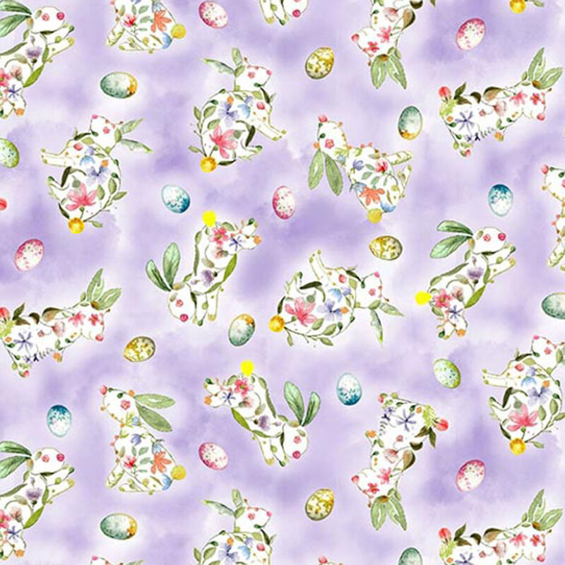 Mottled purple fabric with tossed floral Easter bunnies and decorated eggs.