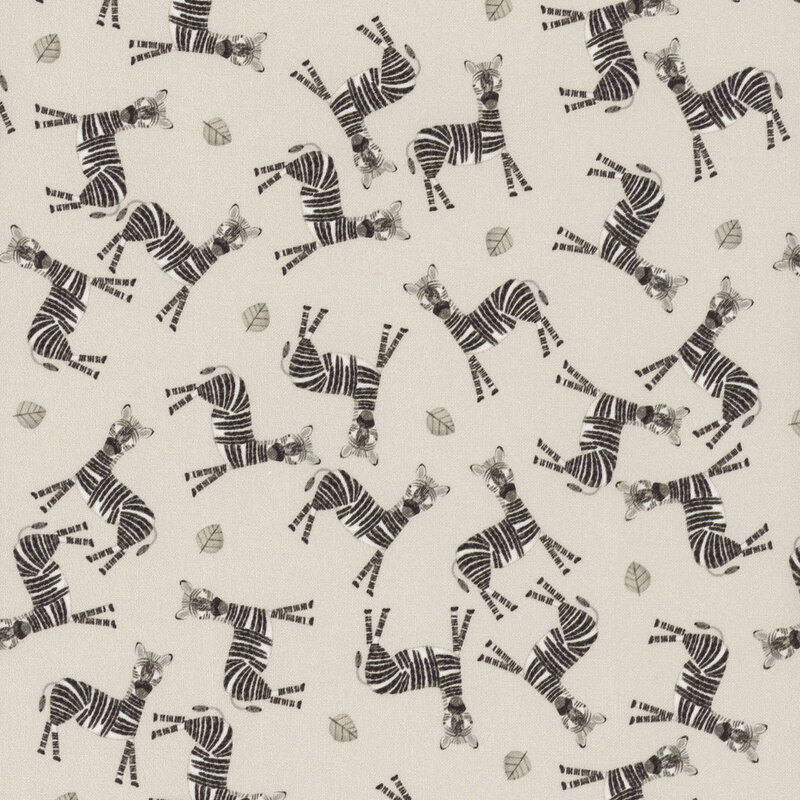 Taupe fabric tossed with zebras and small leaves