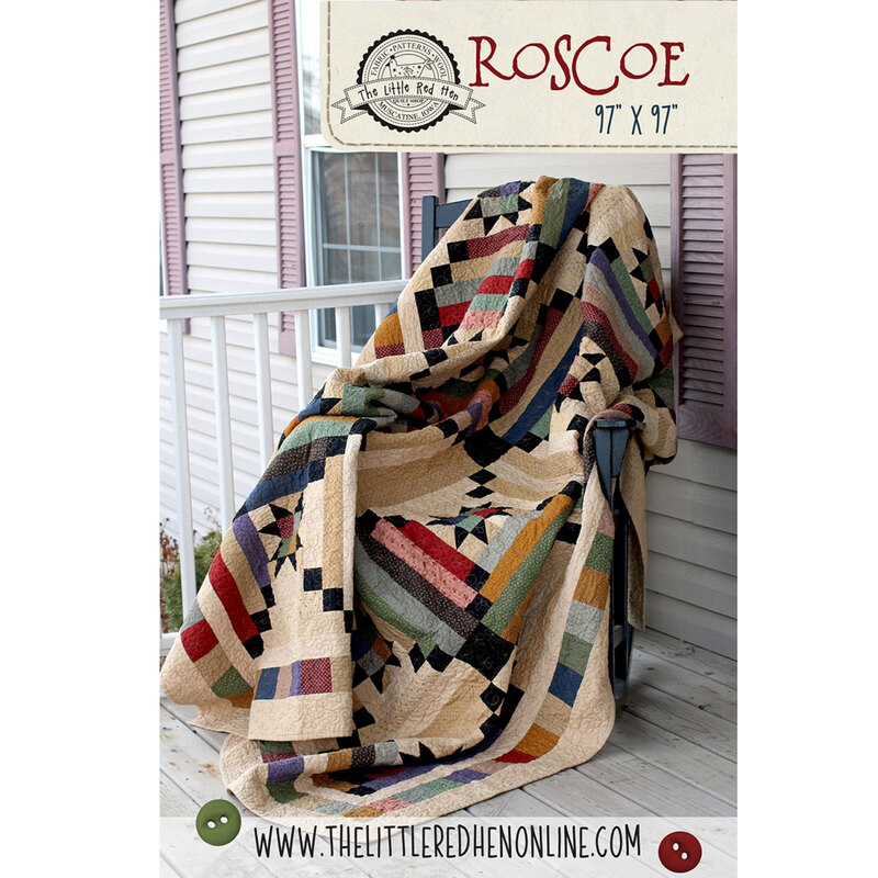 A colorful quilt draped over a wooden chair on a porch, featuring geometric patterns and stripes.