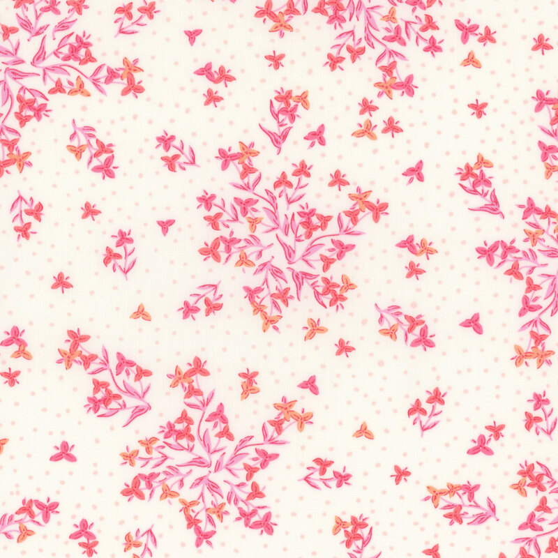 Cream fabric with sprawling pink florals on a pinprick dotted background.