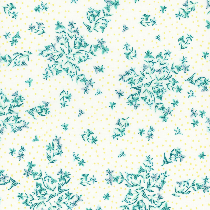 Cream fabric with sprawling blue florals on a pinprick dotted background.