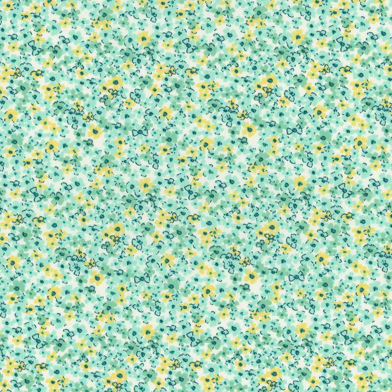 Cream fabric with a packed design of blue and chartreuse blossoms.