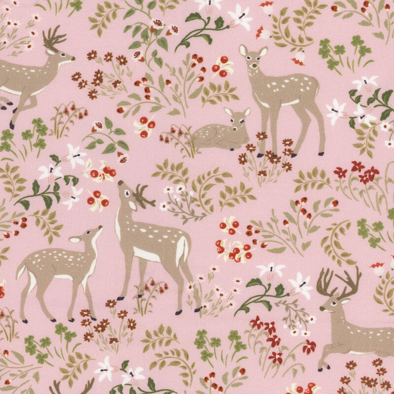 fabric pattern of deer surrounded by florals on a pink background