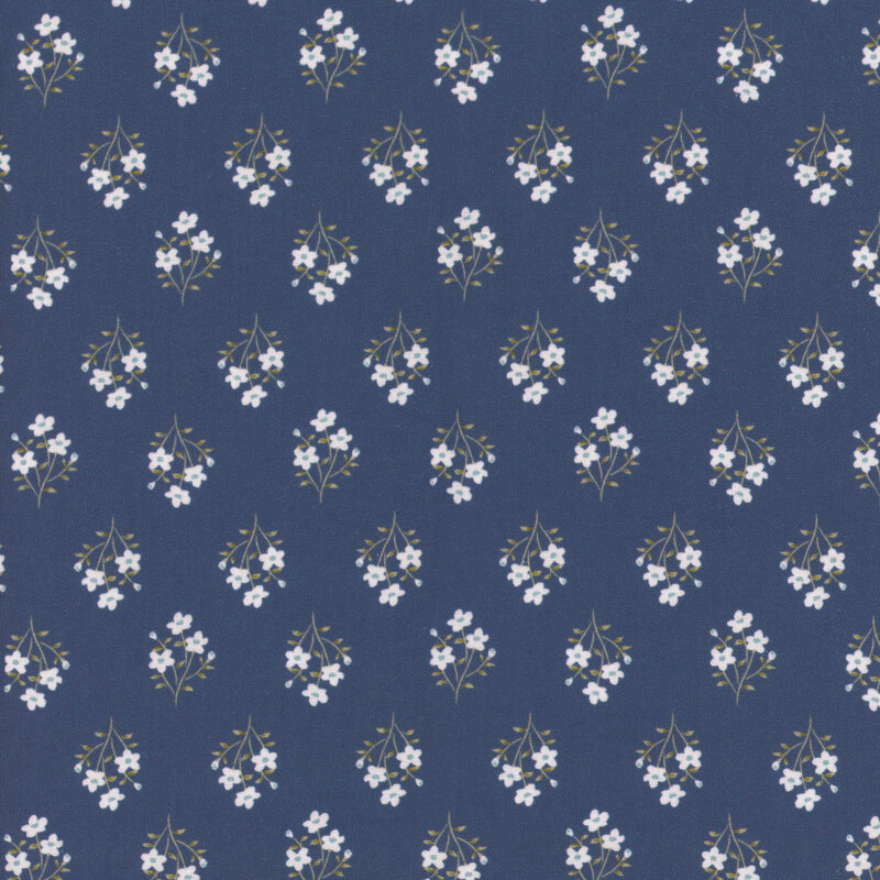 fabric pattern of a white flower bouquet over a blue background